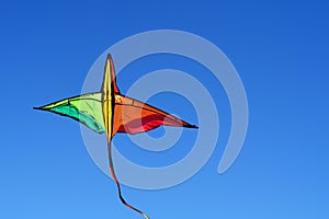 Kite. A kite flying against a blue sky. International Kite Day.