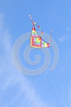 Kite with rainbow colors flying in the sky symbol of hope joy br photo