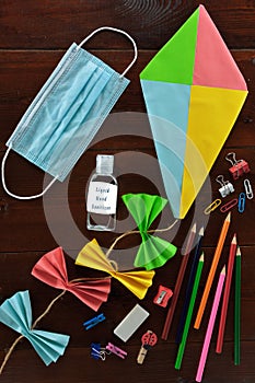 Kite, school materials a mouth mask and  liquid hand sanitizer