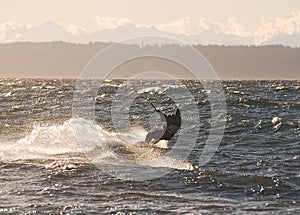 Kite surfer changing course with the wind