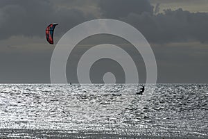 Kite Surfer in the evening sun on the Wadden Sea