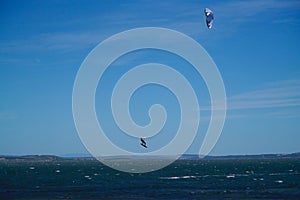 Kite surfer flying in the sky