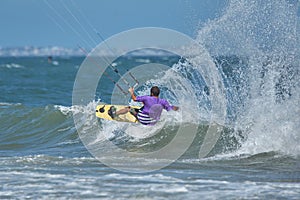 Kite surfer riding a kiteboard