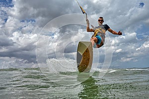 Kite surfer riding a kiteboard