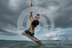 Kite surfer riding a kiteboard