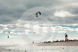 Kite surfers on a beach at sunset, Fuerteventura, Canary Islands, Spain