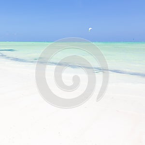 Kite surfers on Paje beach, Zanzibar, Tanzania. photo