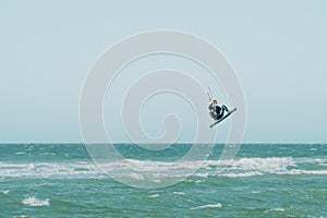 Kite surfers water sport event at neach in Zeeland