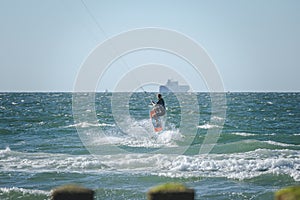 Kite surfers water sport event at neach in Zeeland