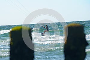 Kite surfers water sport event at neach in Zeeland