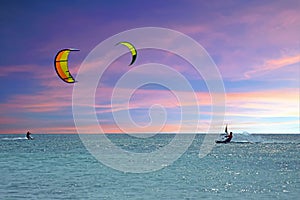 Kite surfing at Aruba island at sunset