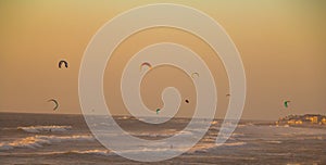 Kite surfing in beautiful sunset