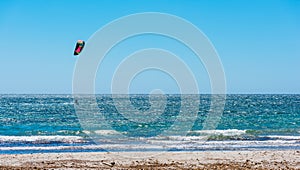 Kite surfing on a clear day