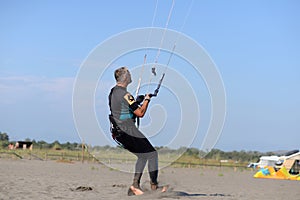 Kite surfing man practicing.