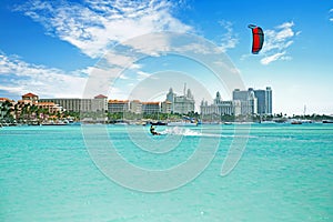 Kite surfing at Palm Beach on Aruba in the Caribbean Sea