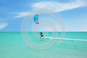 Kite surfing at Palm Beach on Aruba in the Caribbean Sea