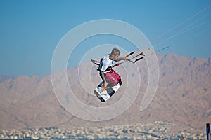 Kite surfing on the sea.