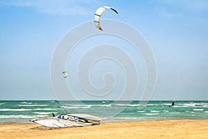 Kite surfing in windy beach with windsurf board