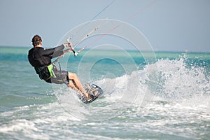 Kiteboarder enjoy surfing