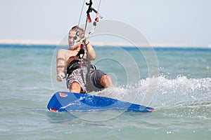 Kiteboarder enjoying surfing