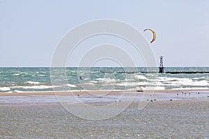 Kiteboarder on Wavy Lake Michigan