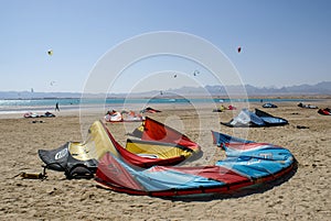 Kiteboarding beach with kitesurfer