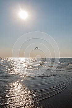 Kiteboarding into the sunset.