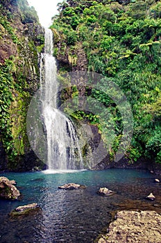 Kitekite Falls in New Zealand. Beautiful view of amazing waterfalls in the middle of the nature.