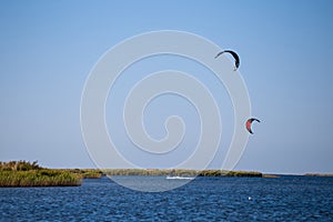 Kiter swimming in a lake