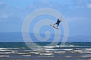 Kitesurfer jumping at Troon, Scotland