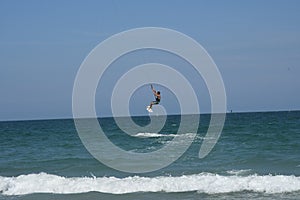 Kitesurfer leaping over waves off Wrightsville Beach