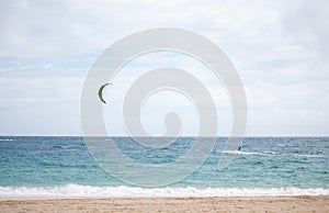 A kitesurfer off the coast of Uoleva in Tonga