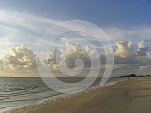 Kitesurfers on IJsselmeer Lake coast photo