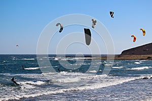 Kitesurfers in El Medano at the Atlantic Ocean Tenerife, Spain