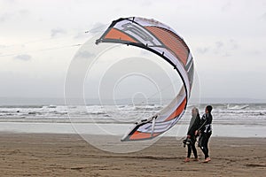 Kitesurfers launching kite photo