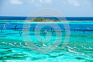 Kitesurfing competition in caribbean island photo