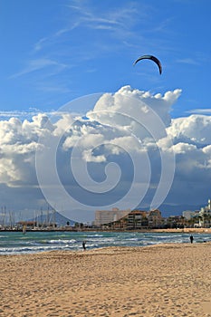 Kitesurfing on a deserted beach