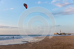 Kitesurfing in the evening along the Dutch coast of Scheveningen