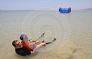 Kitesurfing. Father and son. photo