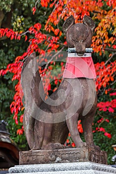 Kitsune sculpture at Fushimi Inari-taisha shrine in Kyoto