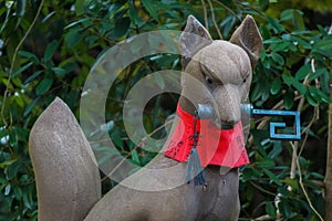 Kitsune sculpture at Fushimi Inari-taisha shrine in Kyoto