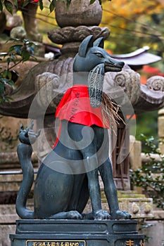 Kitsune sculpture at Fushimi Inari-taisha shrine in Kyoto