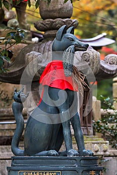Kitsune sculpture at Fushimi Inari-taisha shrine in Kyoto photo