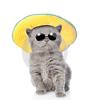 Kitten in sunglasses and hat. isolated on white background