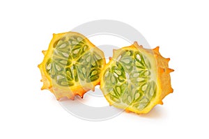 Kiwano or African horned melon slices isolated on white background