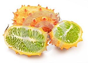 Kiwano fruit with kiwano slices isolated on white background