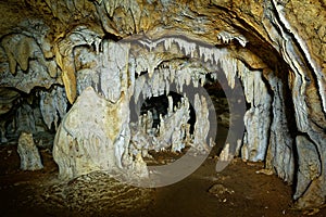 Kiwengwa Caves on Zanzibar island in Tanzania, worship locals ancestors, gifts to the holy stones, stalagmites and stalactites