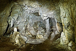 Kiwengwa Caves on Zanzibar island in Tanzania, worship locals ancestors, gifts to the holy stones, stalagmites and stalactites