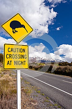 Kiwi Crossing road sign and volcano Ruapehu NZ