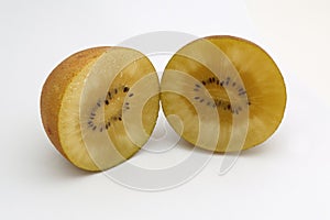 The kiwi fruit is cut in half.